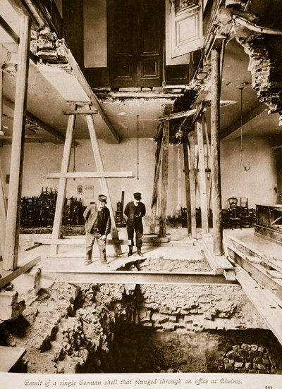 Result of a single German shell that plunged through an office at Rheims, 1914-19 by French Photographer